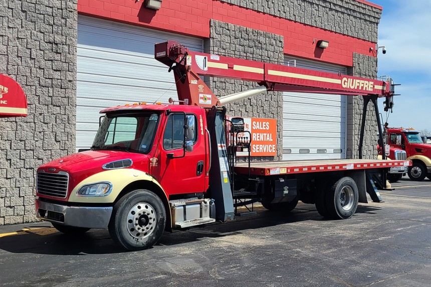 Terex BT3870 on 2013 Freightliner M2 106 Front Street side view