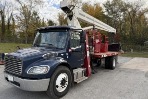 Terex BT3870 on 2013 Freightliner M2 106 Allison - Front Street Side