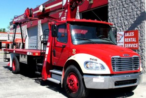 Terex BT3870 on 2012 Freightliner M2 106 Front curb side view cropped