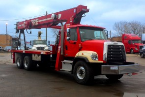 Terex BT5092 on 2014 Freightliner 108SD front street side view