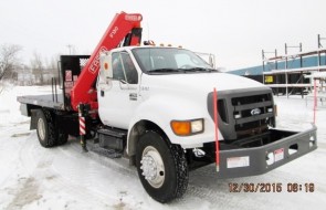 Fassi F130A.23 knuckleboom on 2011 Ford F750 - Front passenger side