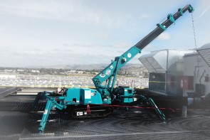Maeda - MC285 Mini Crawler Crane Working on Rooftop