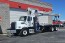 White Manitex 2892C on 2016 Freightliner 108SD - Front Street Side