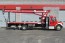 Terex BT3870 on 2013 Freightliner M2 106 curb side view